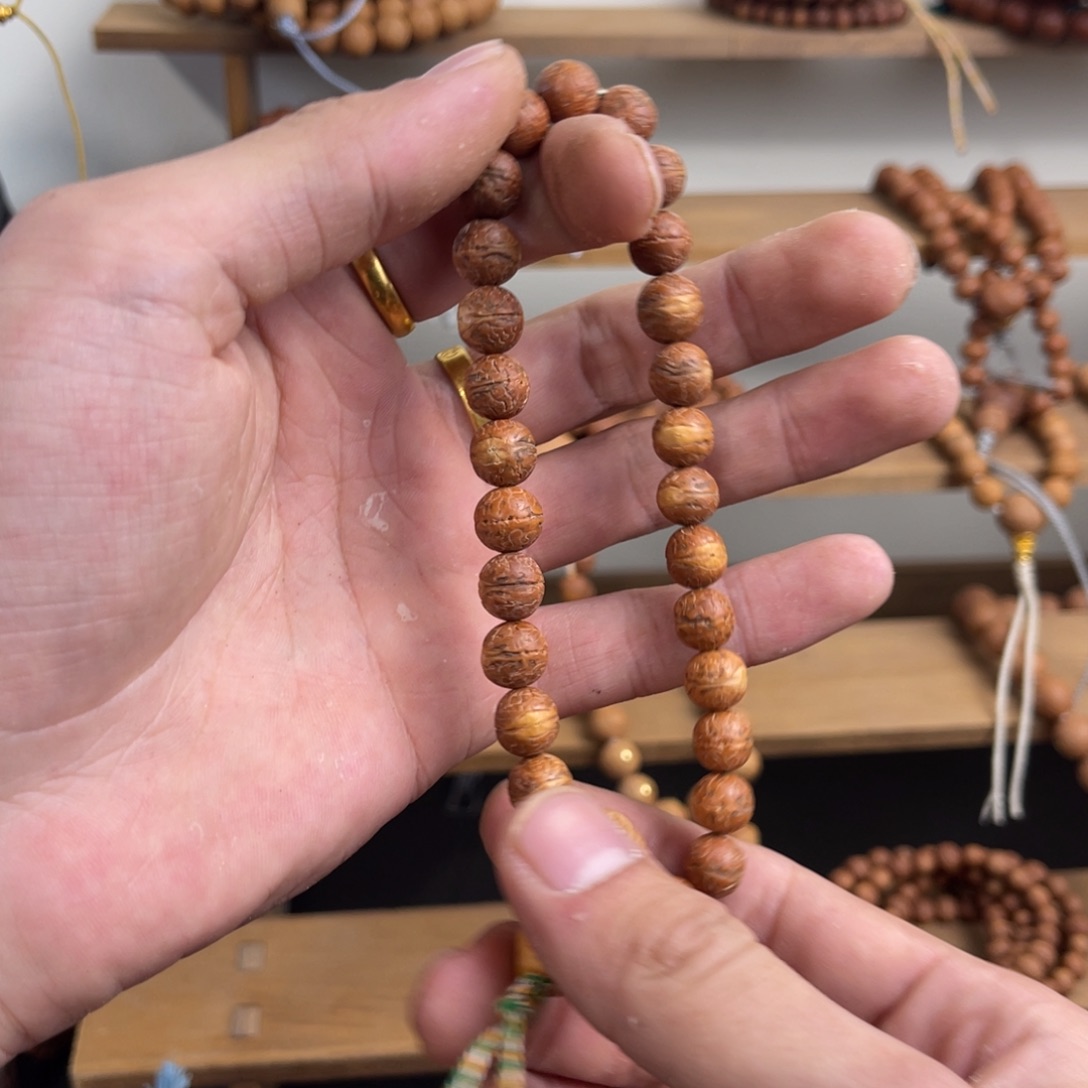 小***志凤眼菩提吊坠酸枣精雕