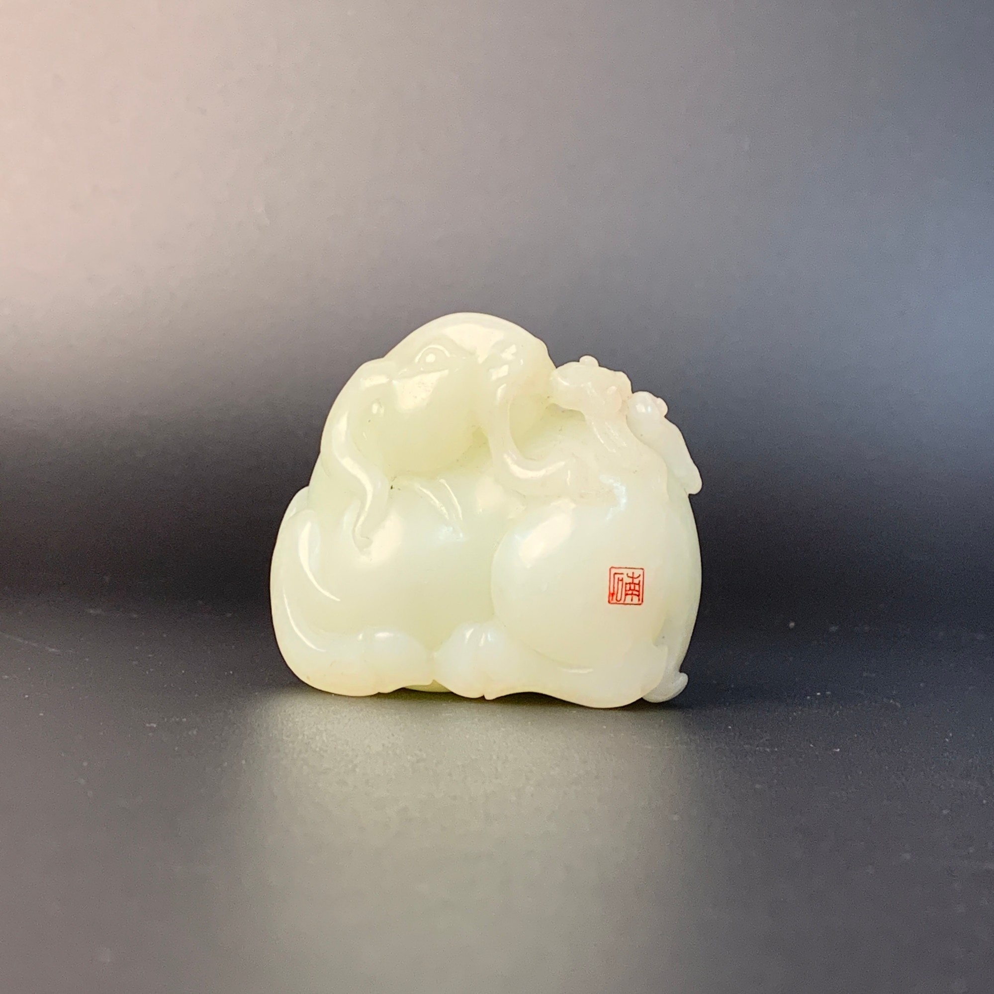 和田青白玉灵羊献宝手把件（刻印）  6.3cm  201gZBM25ZBM0522011