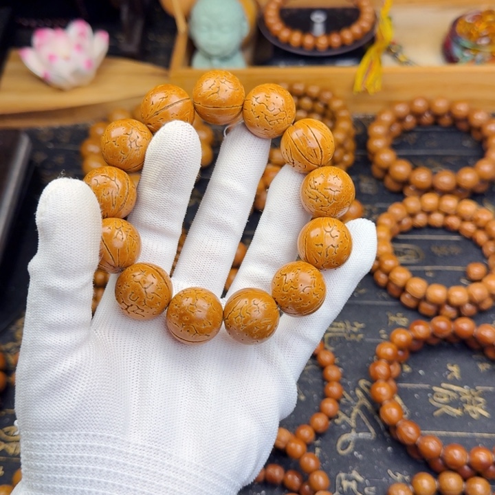 涛***）手串桃核19尺寸小金豆