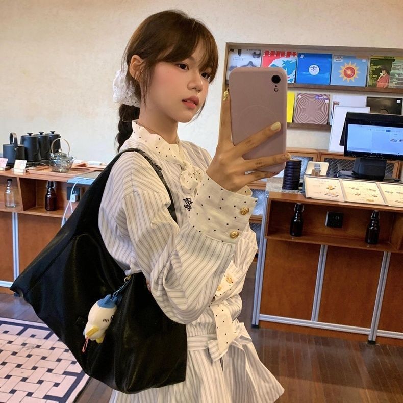 蝴蝶结条纹刺绣长袖连衣裙女2025春季新款设计感收腰显瘦A字短裙