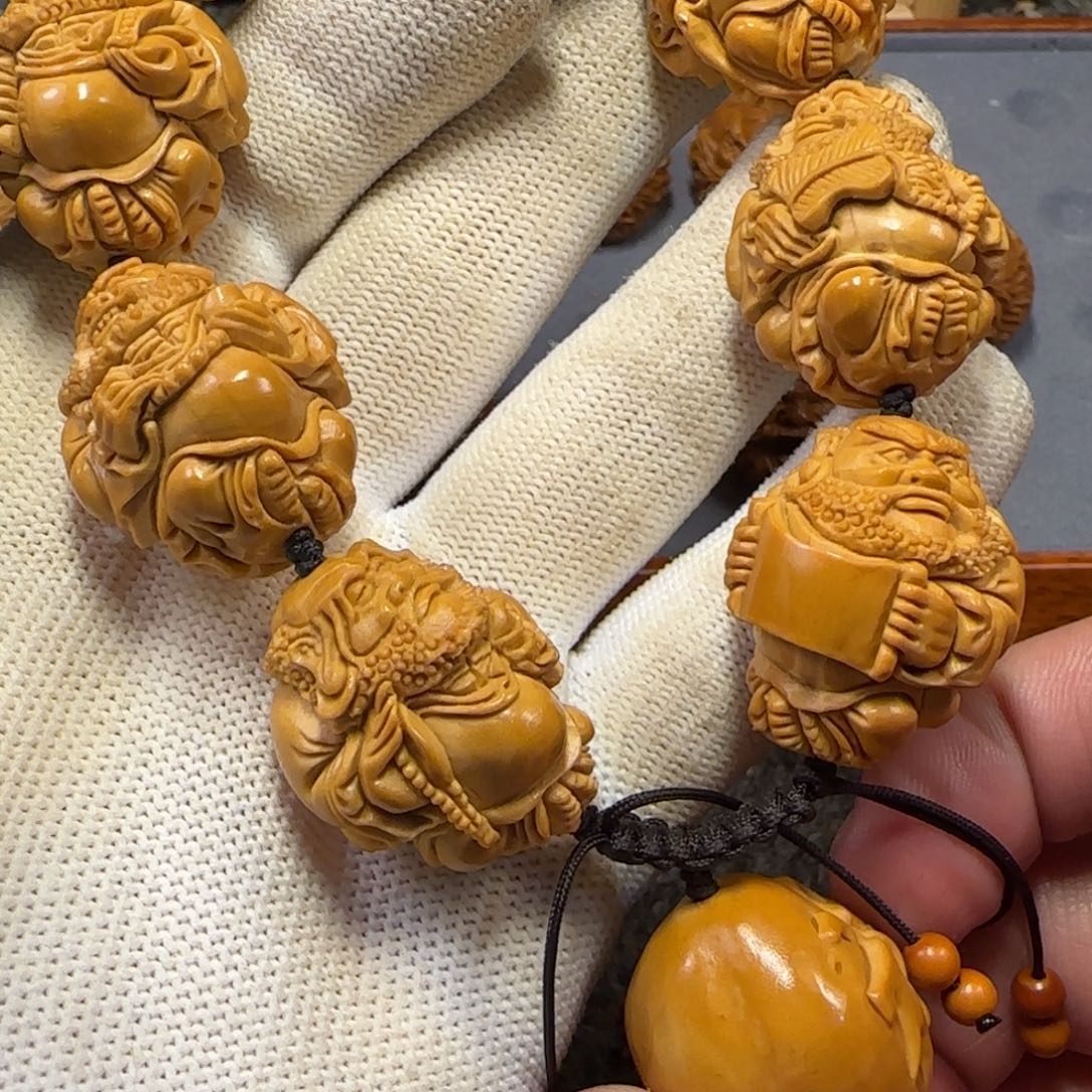 橄榄核吊坠达摩呀呀