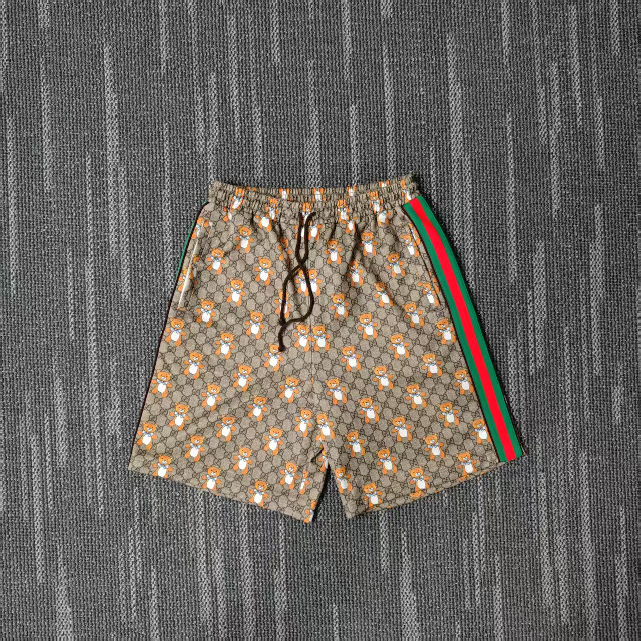 99新 GUCCI/古驰 联名Kai图案印花满印休闲直筒短裤/尺码M