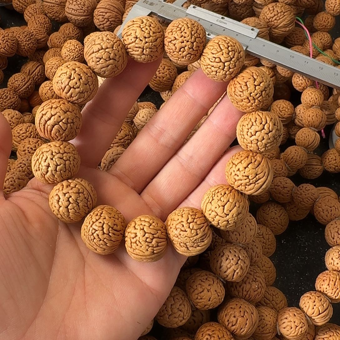 山***奇桃核吊坠野生肌肉手串