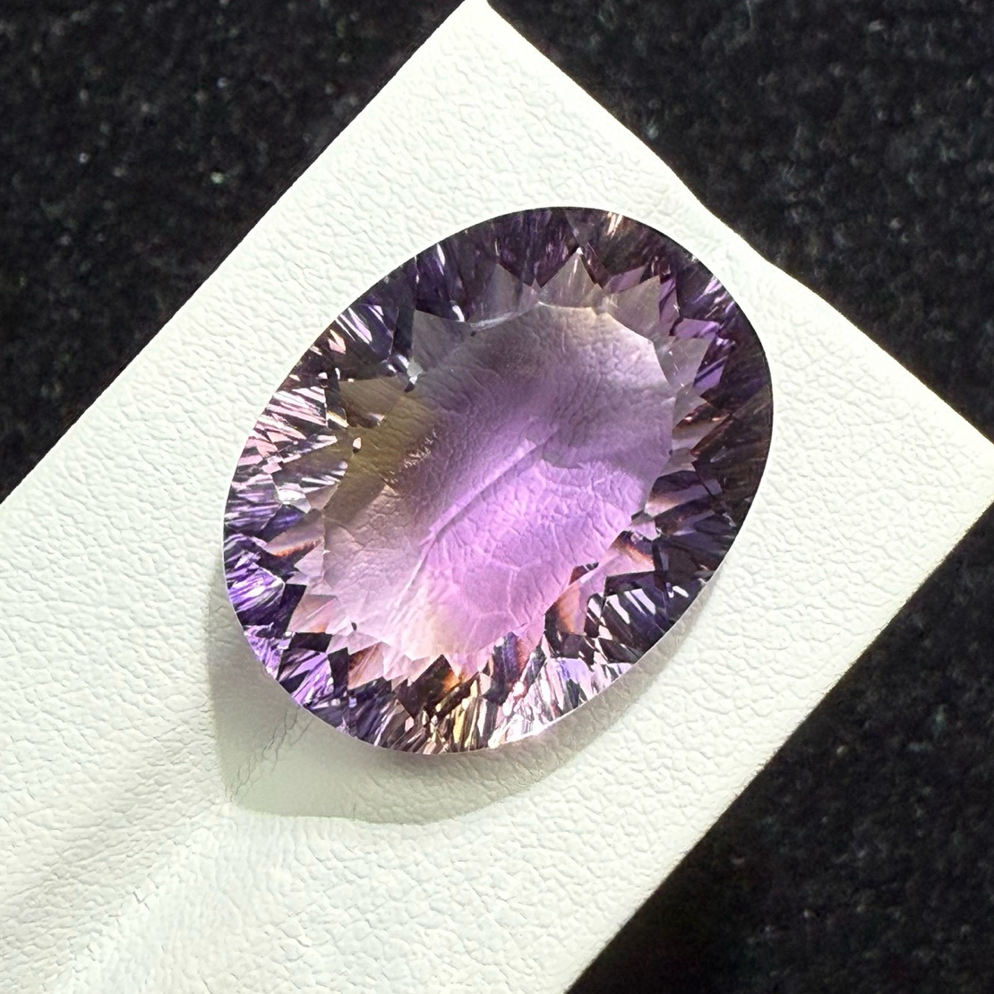 26.95ct天然紫黄晶裸石，尺寸23.4*18*10.1 毫米，颜色美艳 