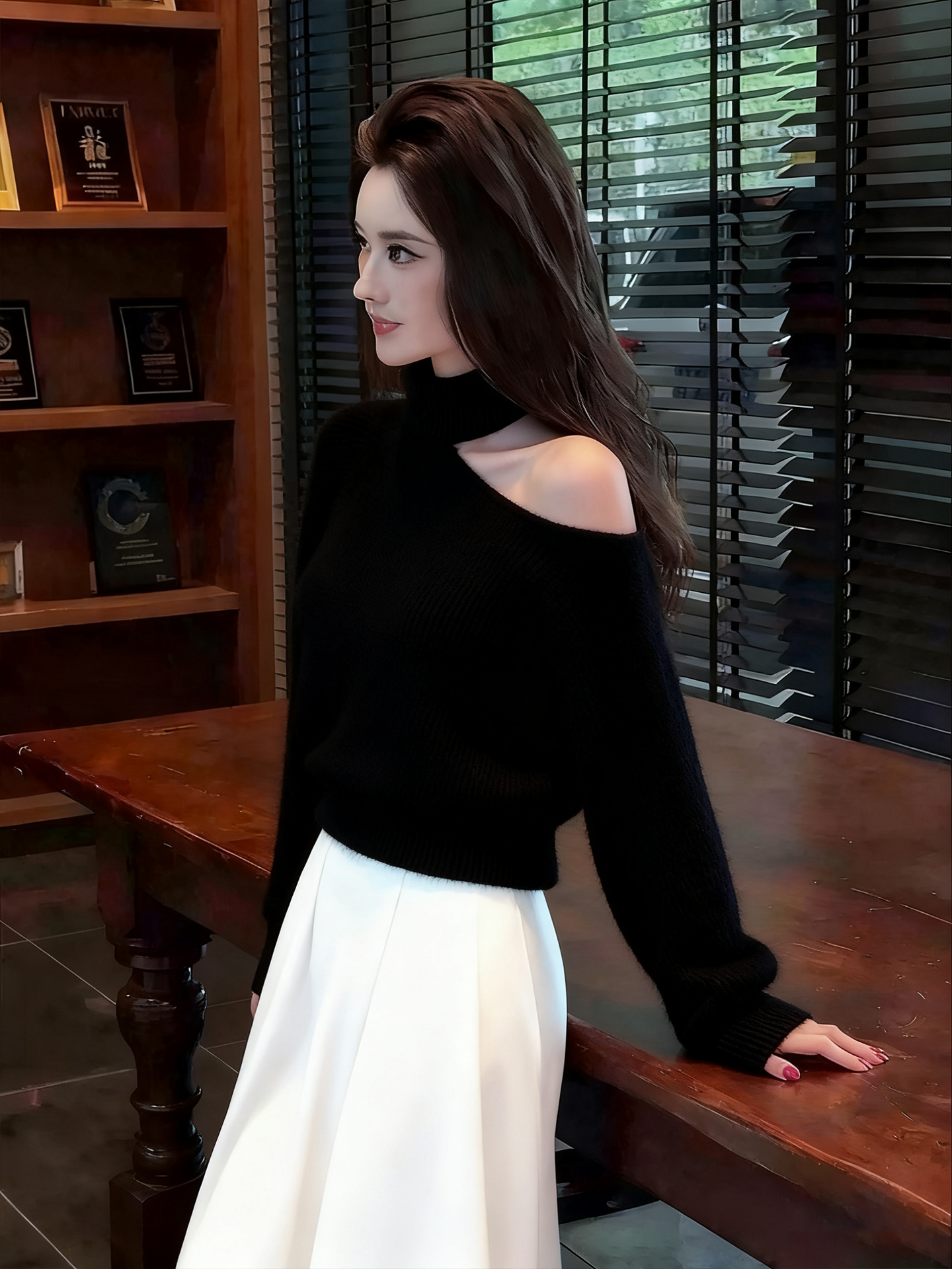 韩系慵懒风黑色挂脖露肩针织衫女秋冬2025新款轻熟风宽松软糯毛衣