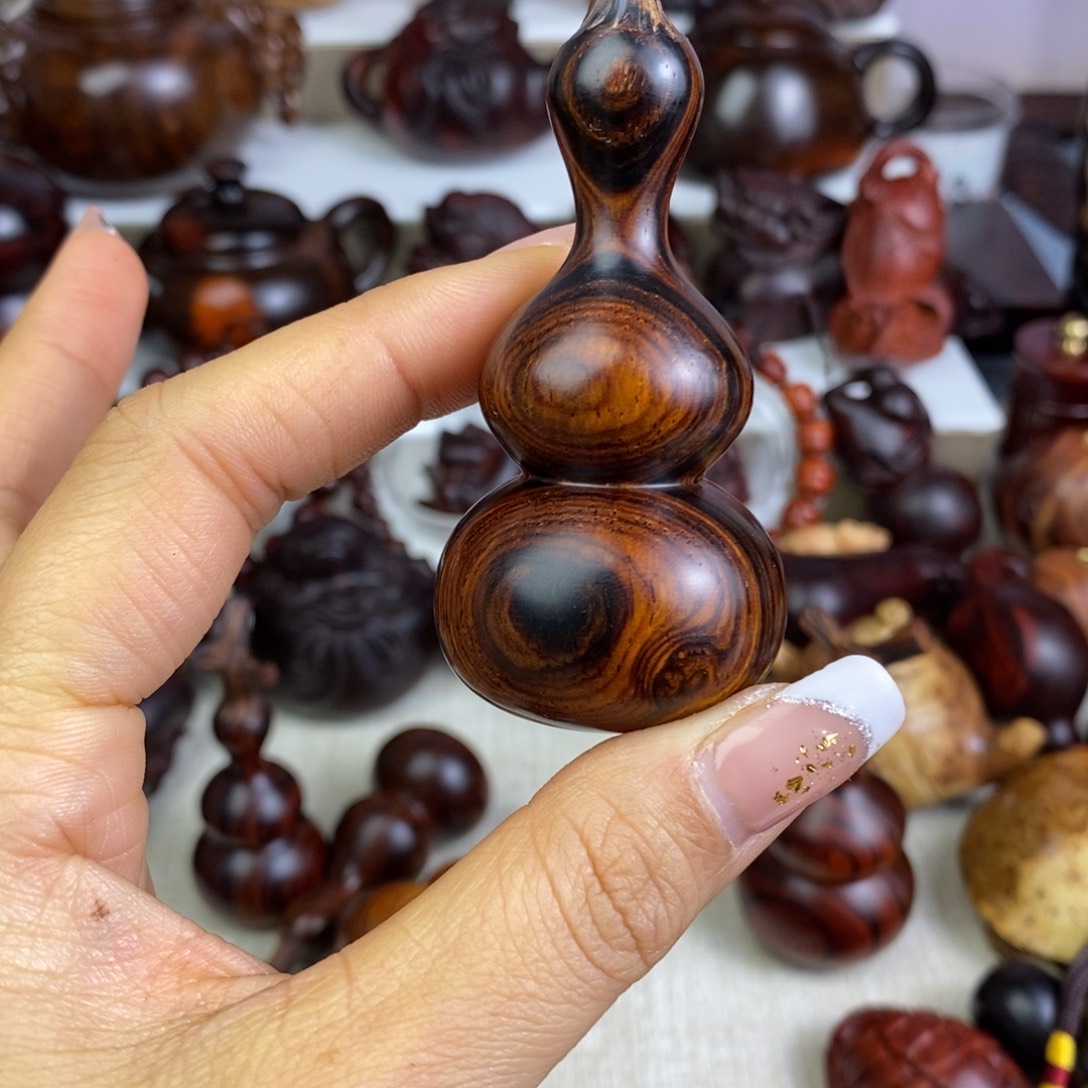 冬***冬木微凹黄檀手把葫芦手把件