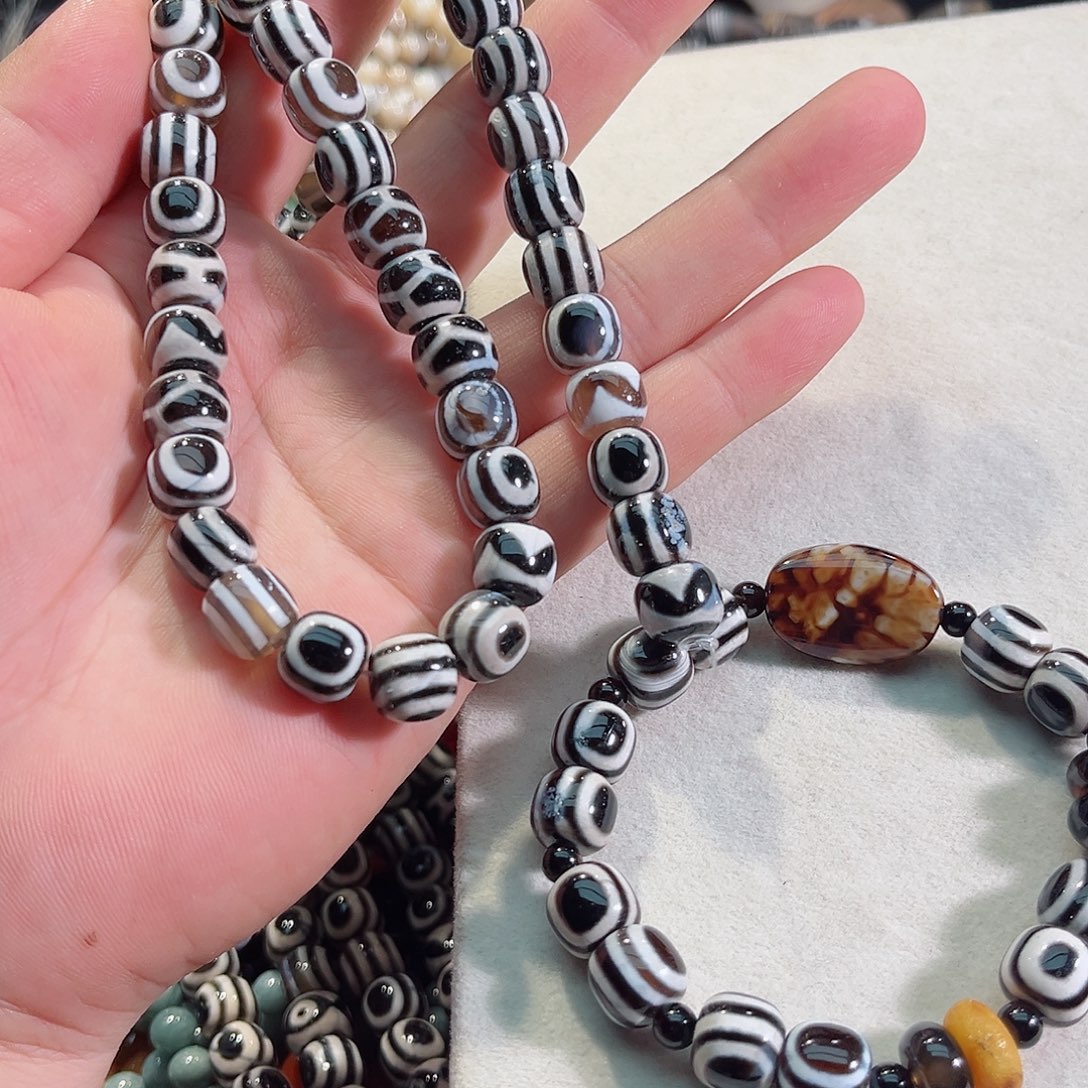 玛瑙/玉髓未镶嵌珠宝半成品蚕丝板眼老玛瑙墩墩一条11mm