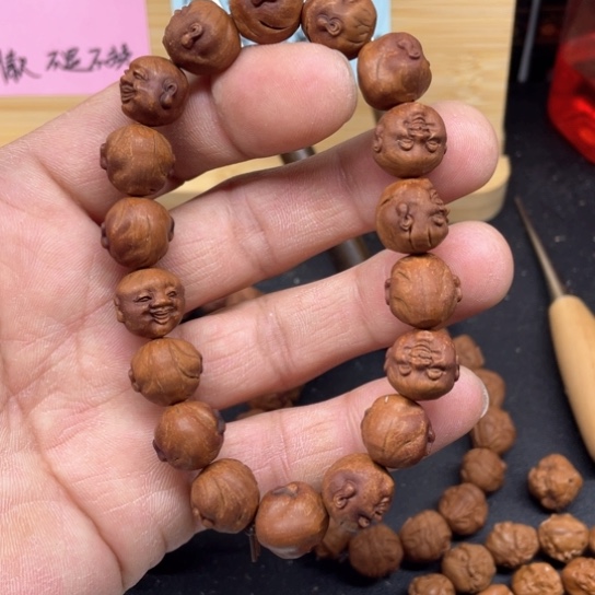 龙纹桃核色差开心