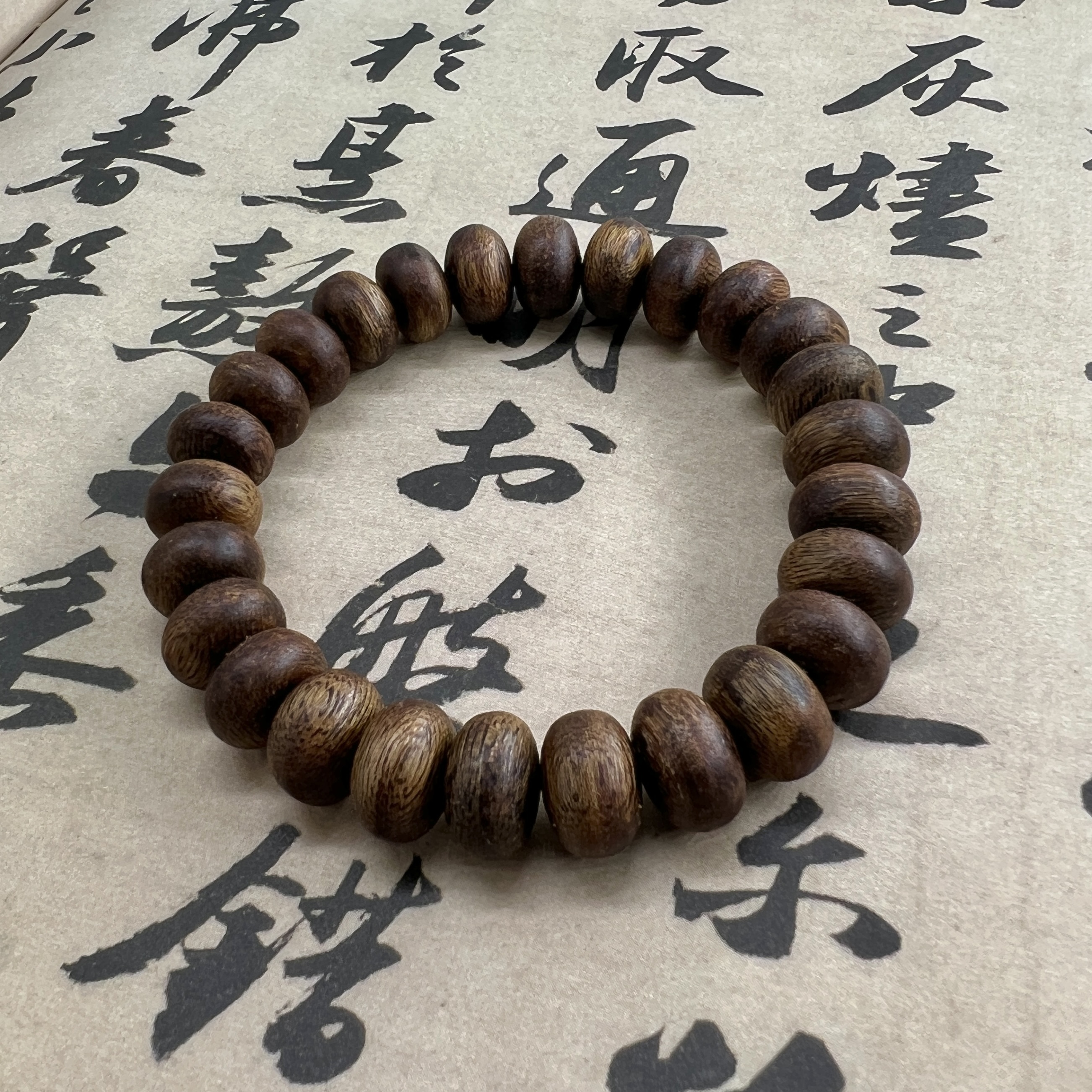 沉香【假一罚万】12mm算盘珠手串单圈产地天然海南莺歌绿奇楠沉香