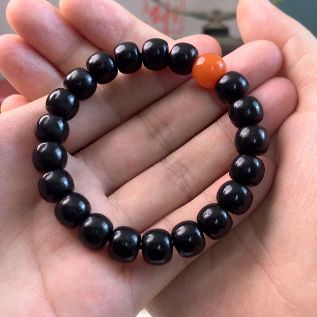 和田玉黑青未镶嵌牛**坤