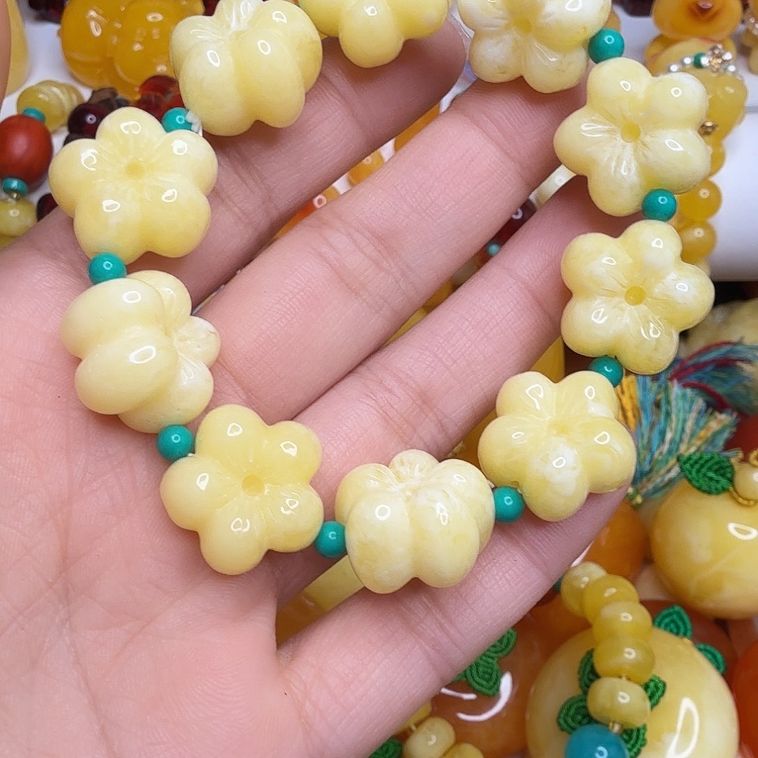 长***)非金属花花手串单颗