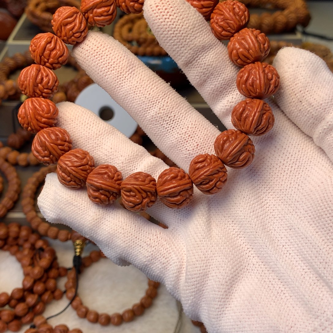 跃***好手串桃核秦岭龙纹