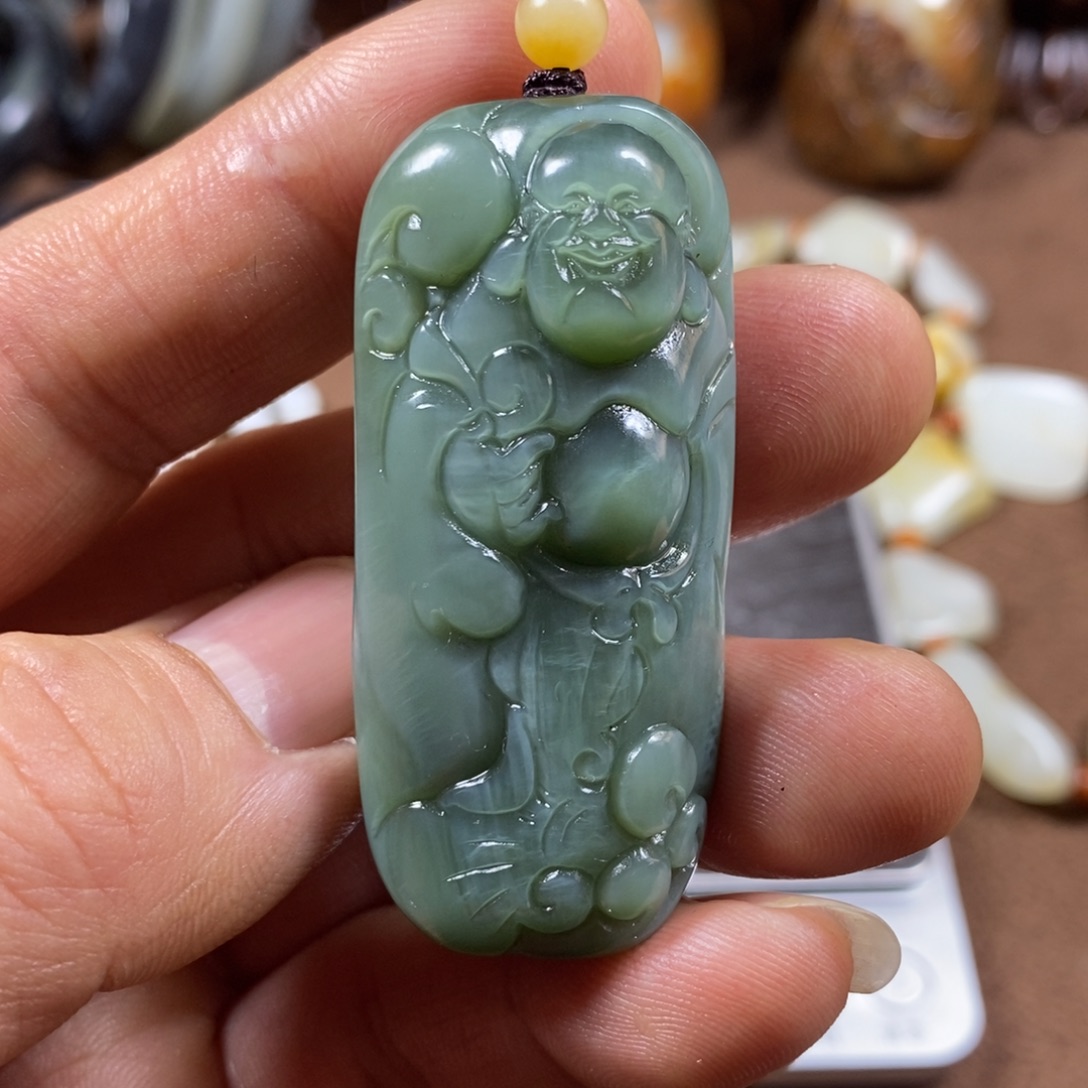 用***子和田玉未镶嵌把件