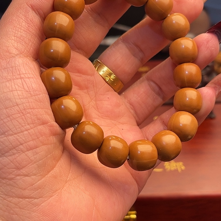 橄榄核吊坠猴头手串