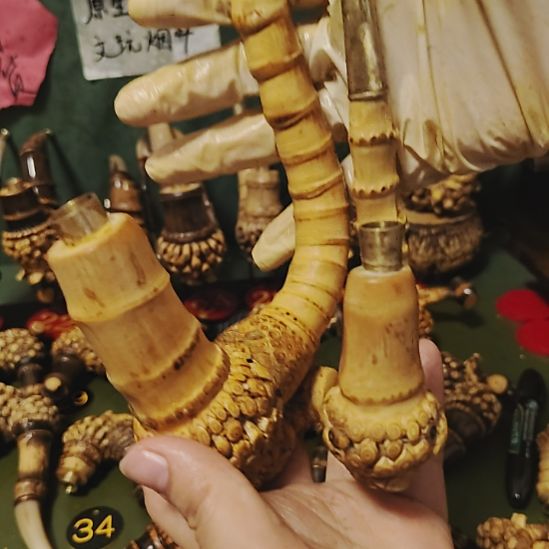 自***。贵州特色竹根烟斗工艺品手把件