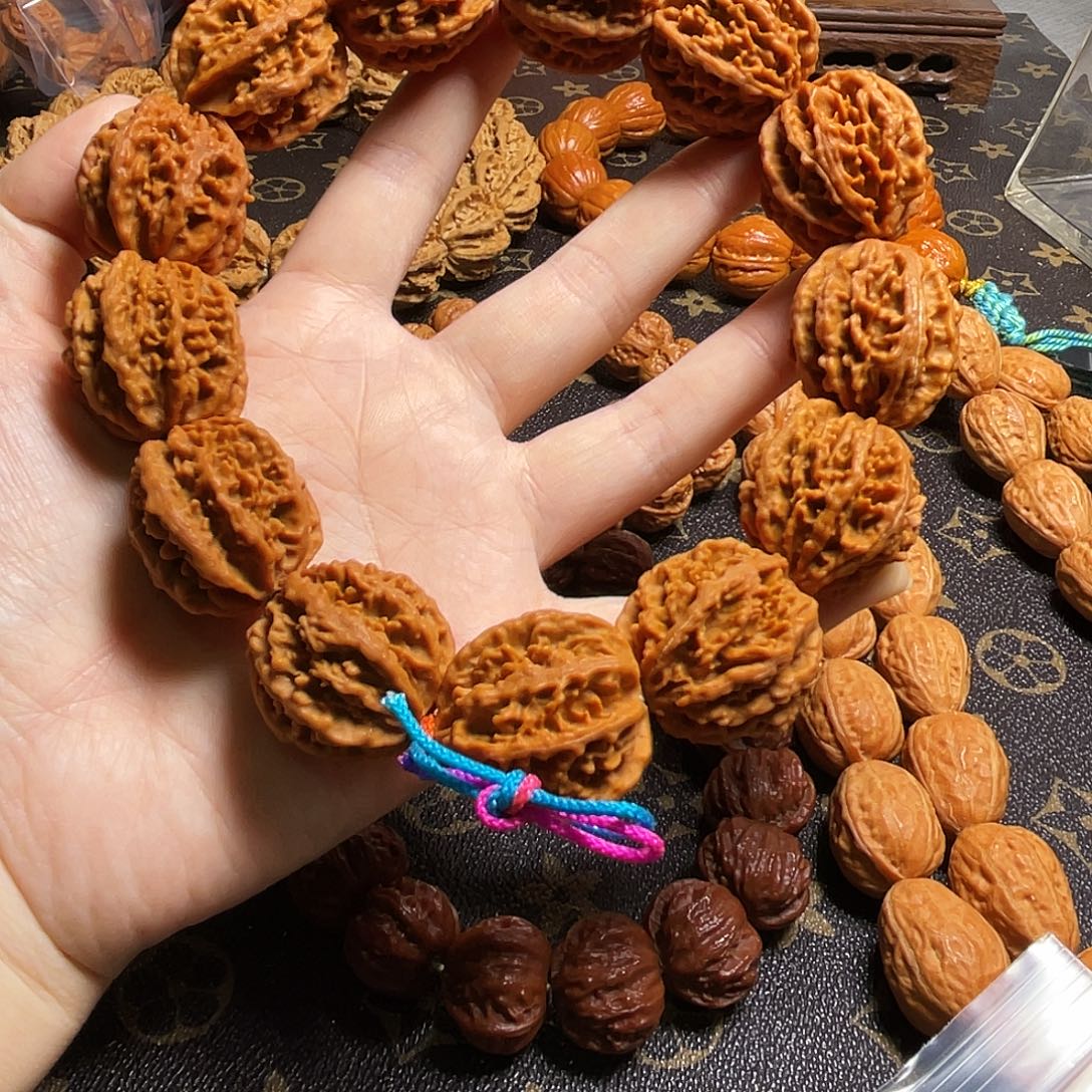 核桃八棱火焰纹手持