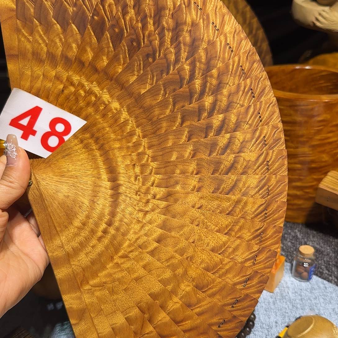 金丝楠岳****辉金丝楠手把件