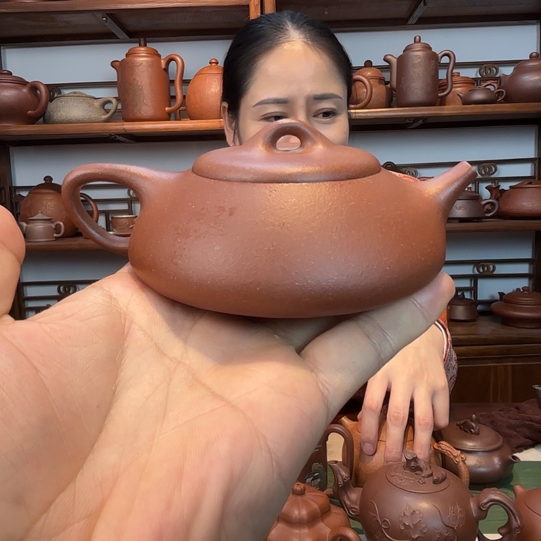 茶杯紫砂压手石瓢