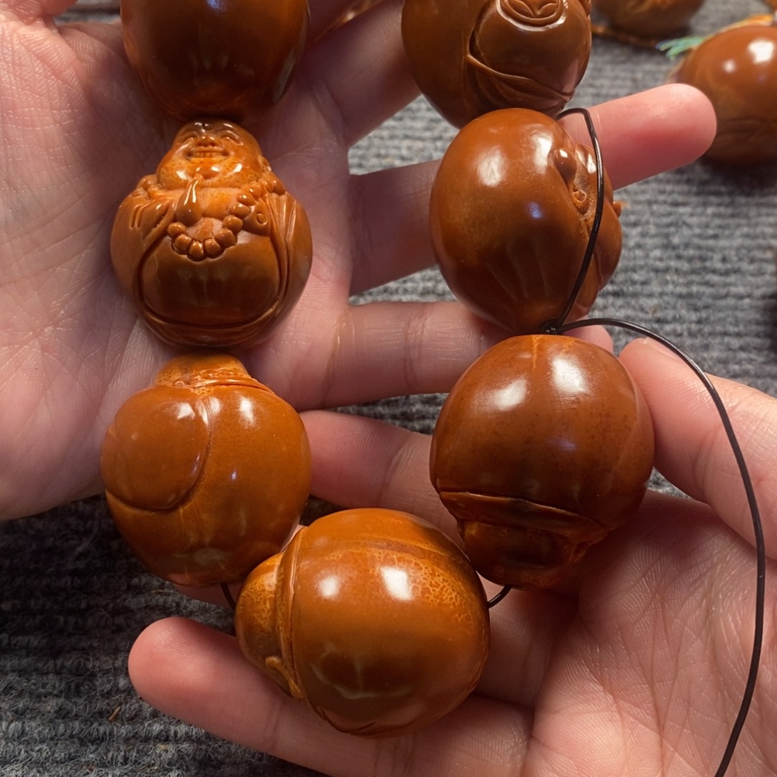 爱***舌橄榄核手串/手链光被弥勒