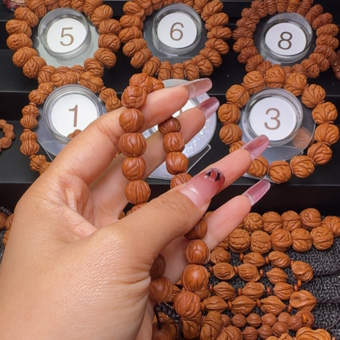 玫***语文玩核桃手串小龙纹手串