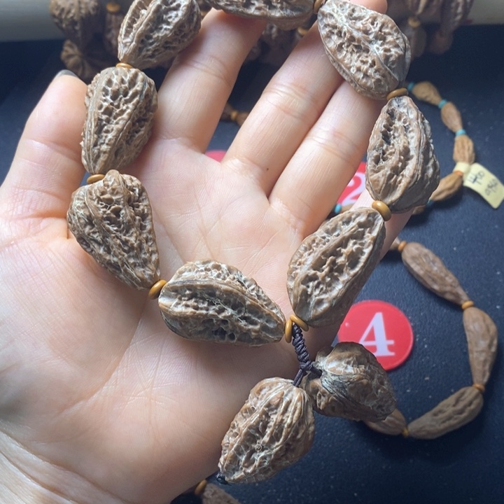 @****伤文玩异形秋子手串 