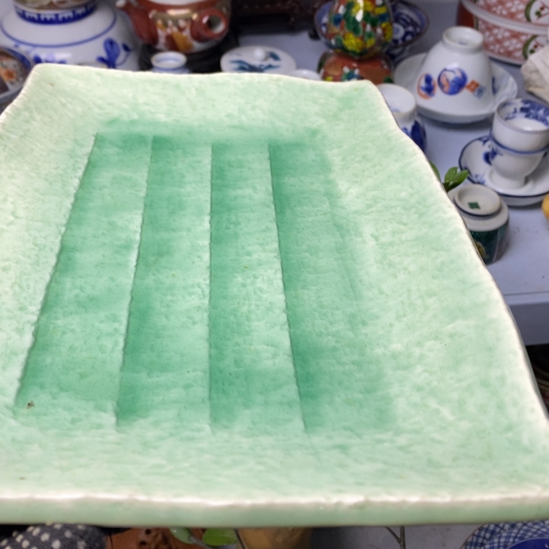 瓷片不能用一丝不满形容