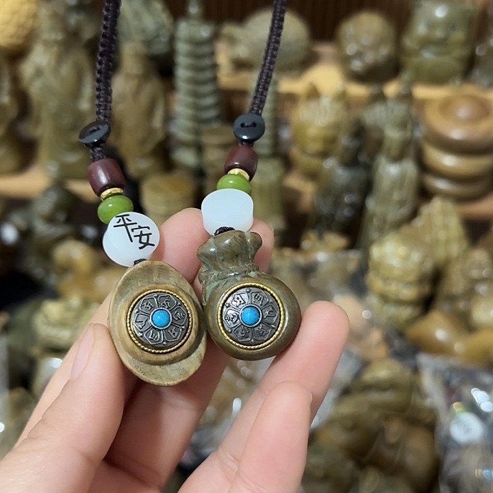 渐**远阿根廷绿檀手把件