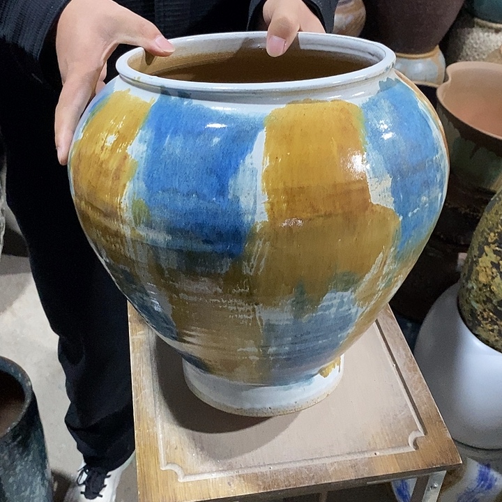紫砂花盆口23高度32蓝油画？……