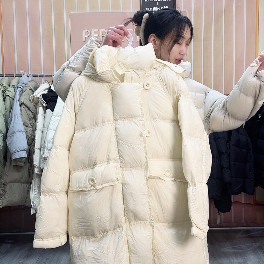 溪*米色大长款泡芙羽羽