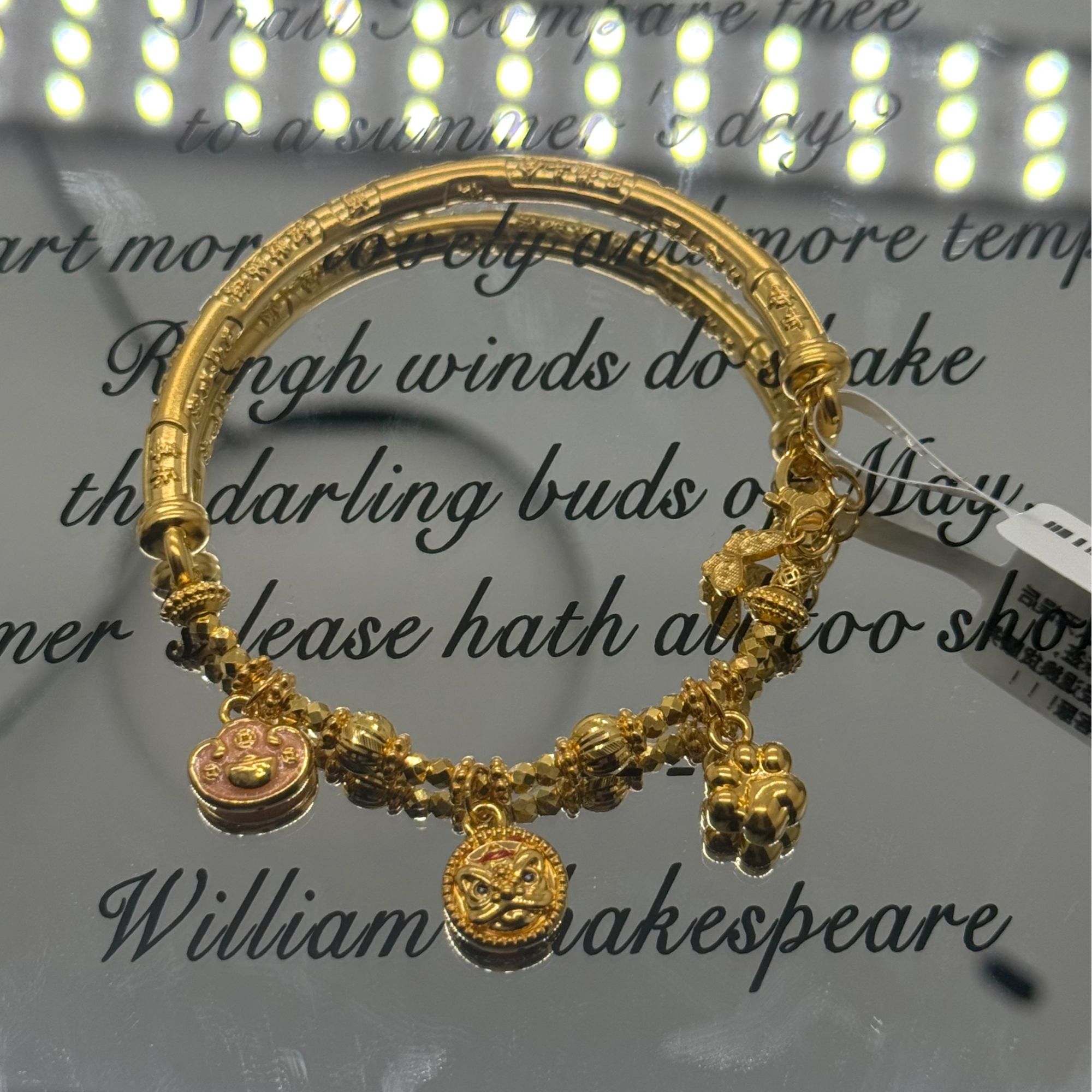 足金999珐琅彩醒狮元.宝弯管手链 12050001