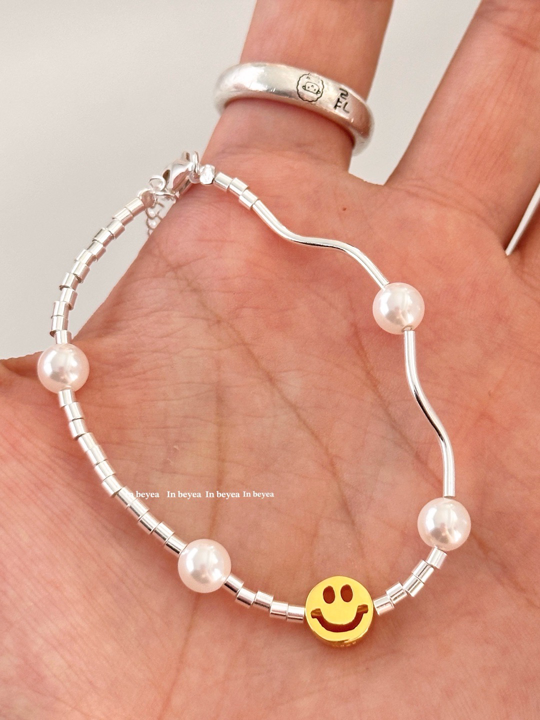 925银仿珍珠手链 笑脸手链16+4cm 4762