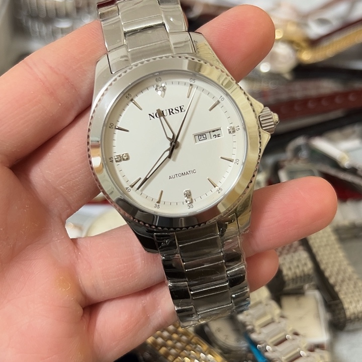 平***随钢牛皮（革）钢石英机芯