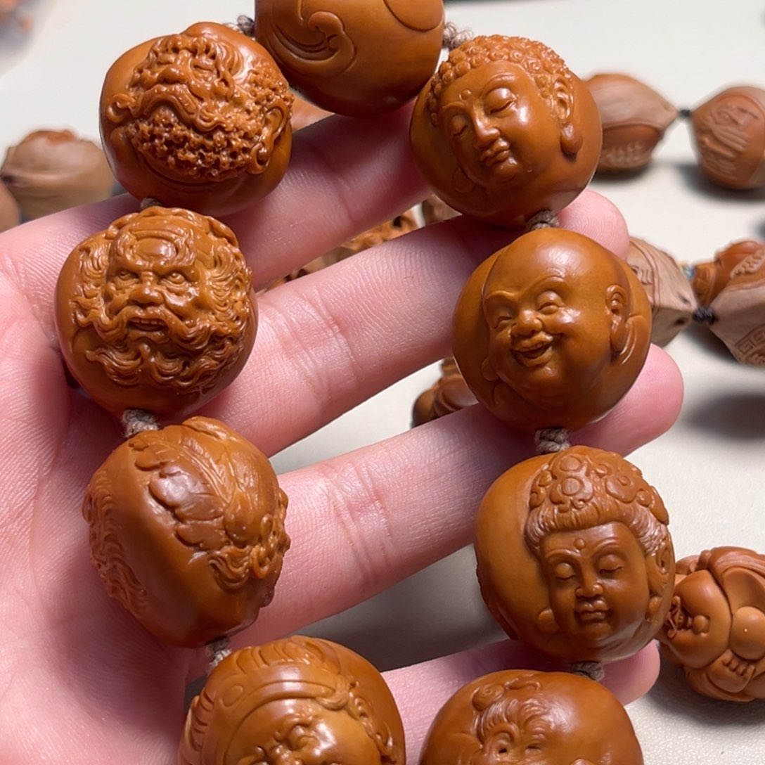 橄榄核吊坠已*置百兽群仙