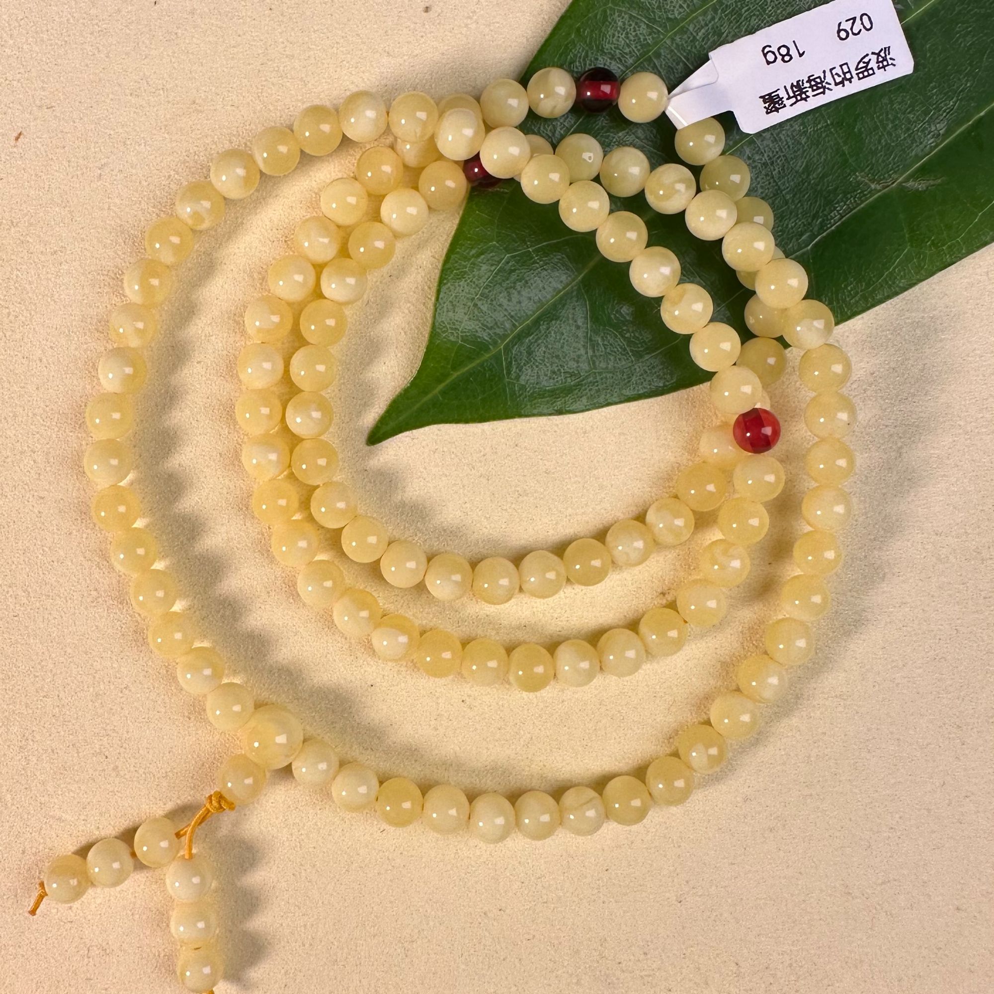 029波罗的海新蜜6mm鸡油黄108挂件