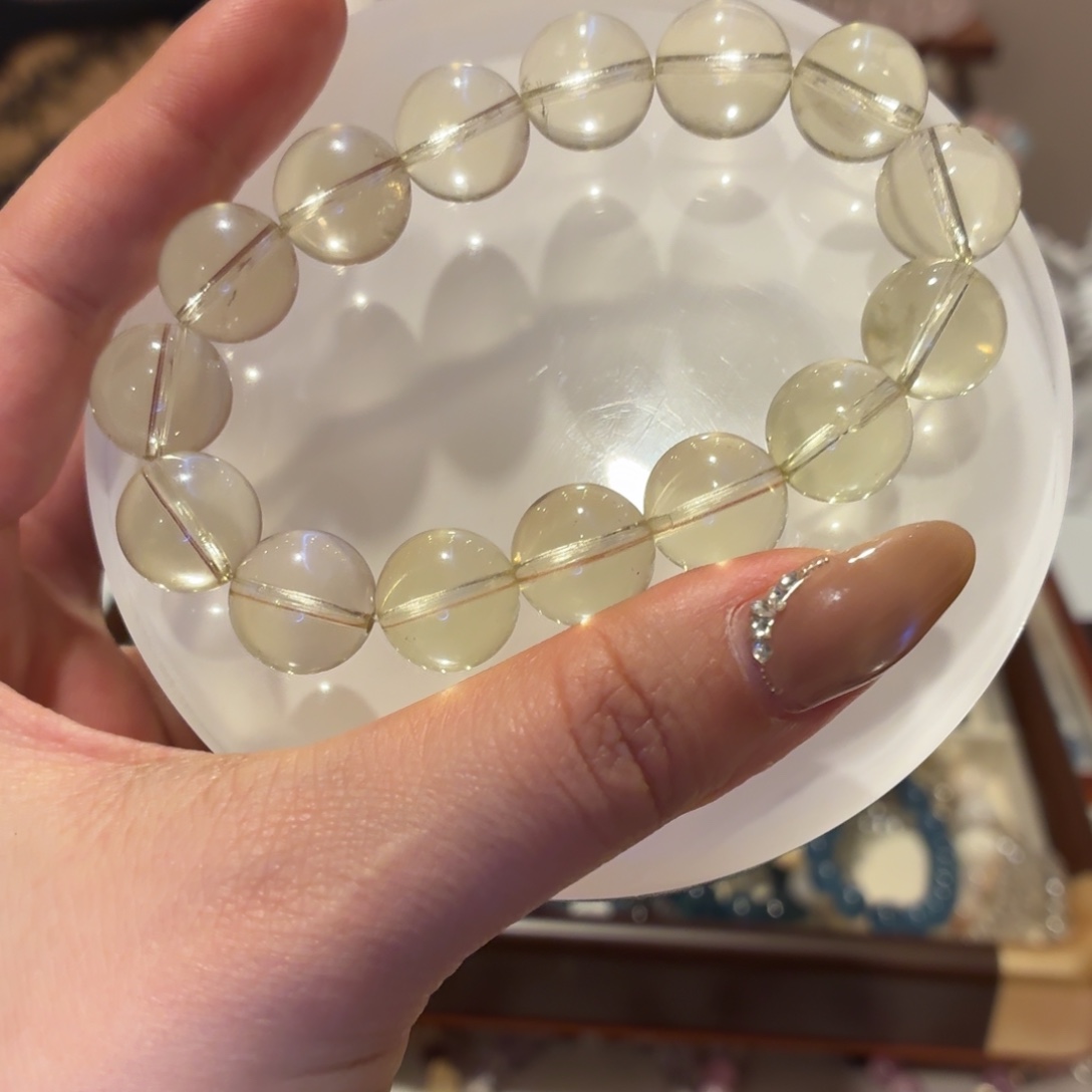 阿***丽银S925镶嵌烟晶手链