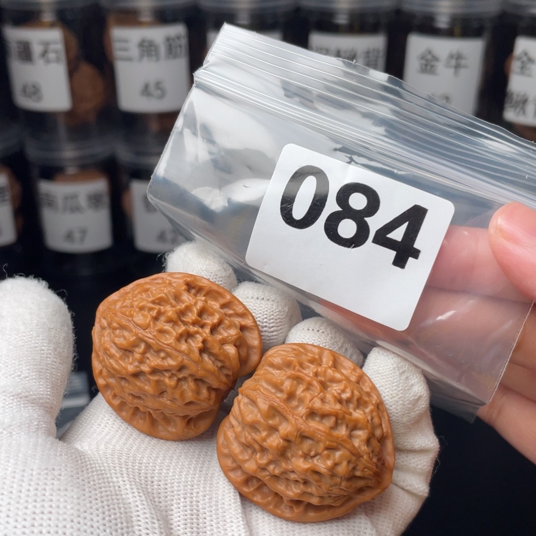 文玩核桃把件38金牛