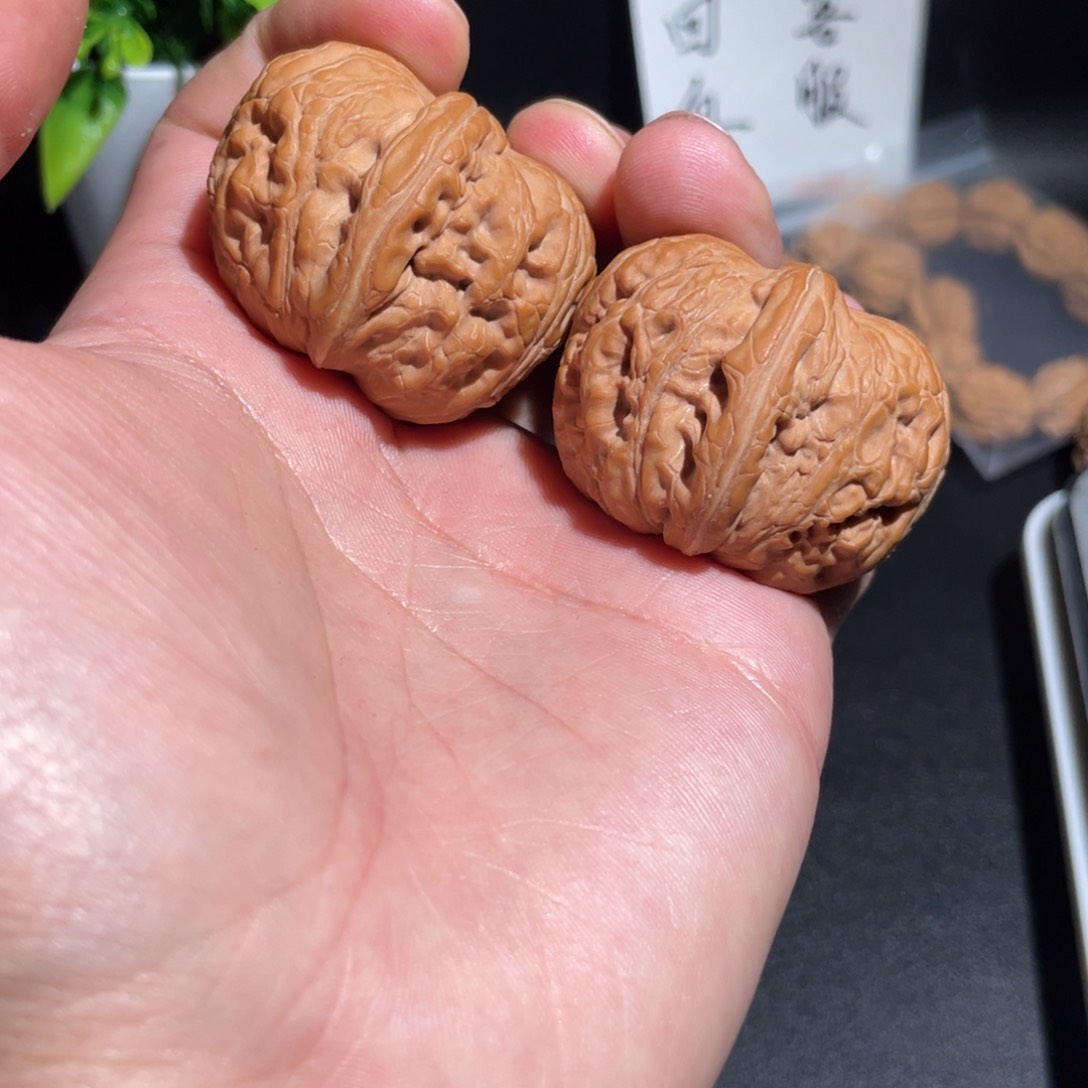 文玩核桃把件42元宝光丝