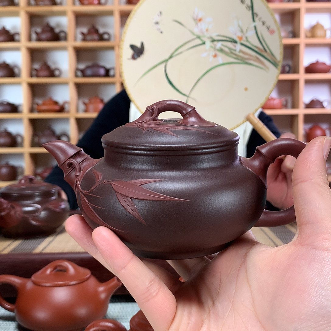 紫砂茶壶快*紫砂壶手工制作