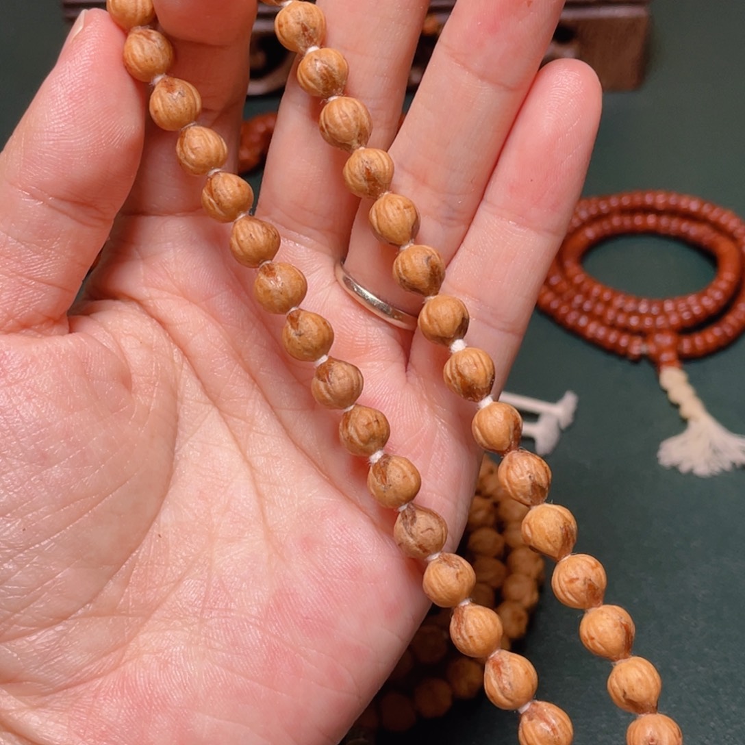 吊坠柏香籽/百香籽红芽莲花手持