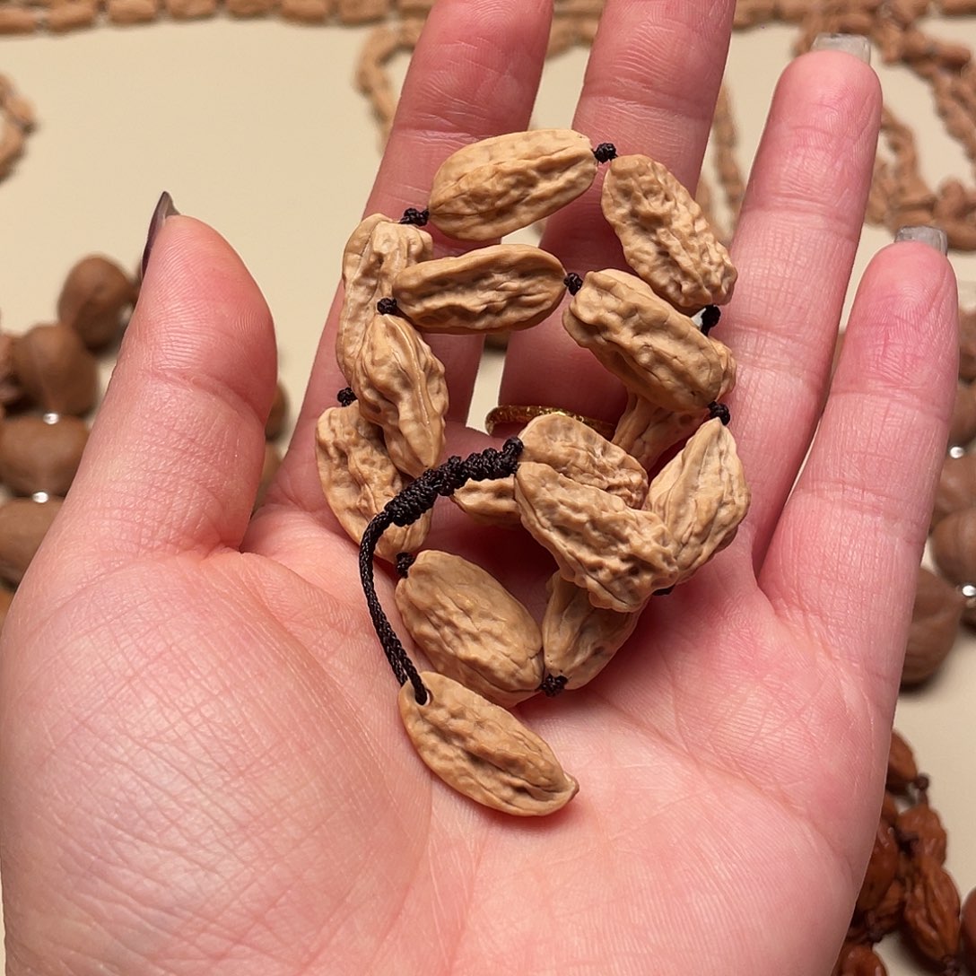 @***子手串桃核异形手串