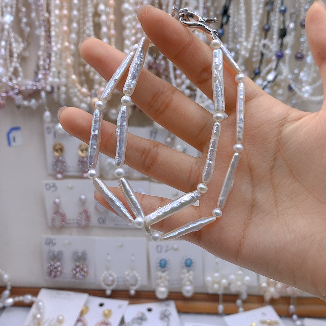 银S925镶嵌淡水珍珠发饰真***?