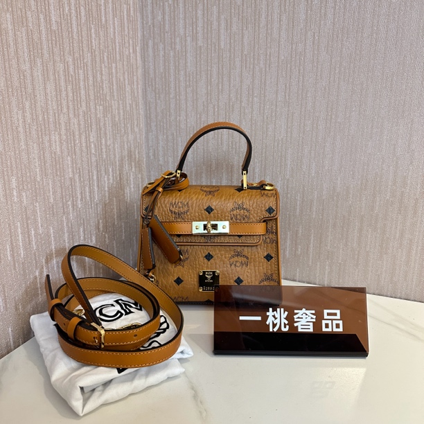 99新 MCM 一桃/mcm 干邑色kelly 手提斜挎