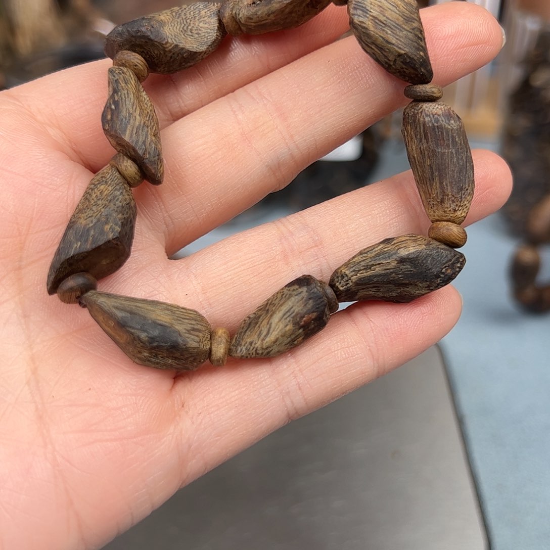 沉香木手把件奇楠张芍子沉水树丁手串10克