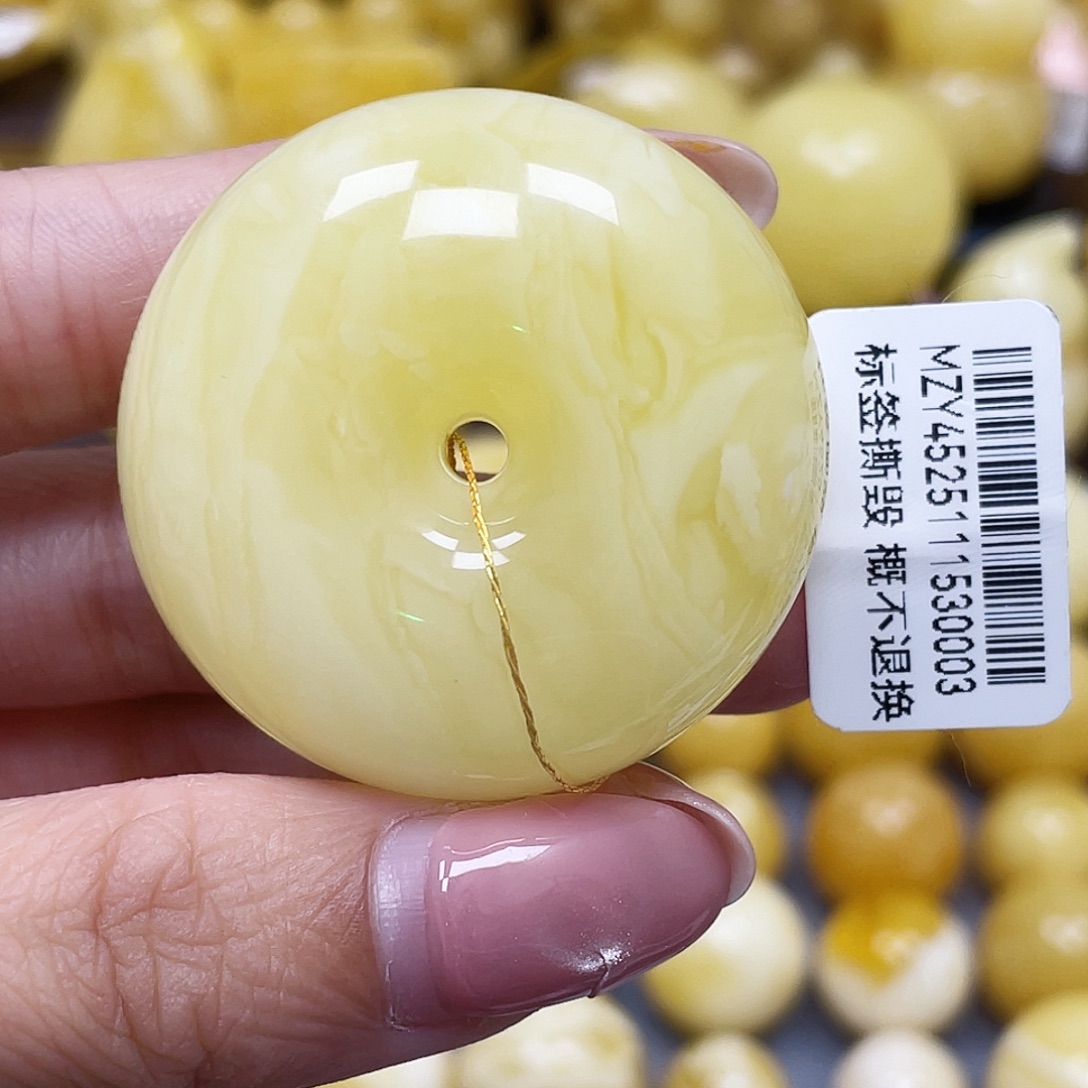 甜****蜜蜡未镶嵌裸石39.8*20.2mm瑕