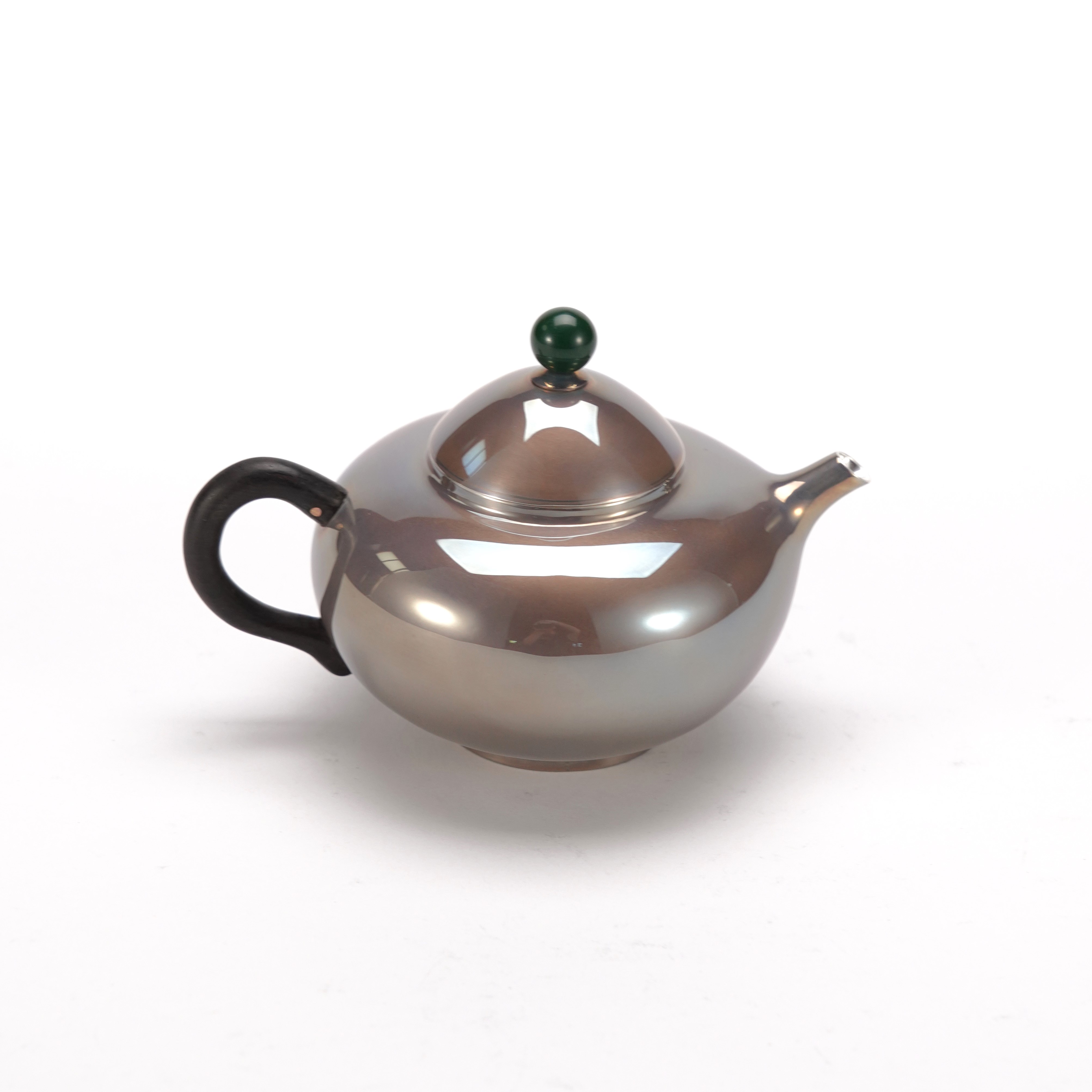 口打出合欢足银泡茶壶