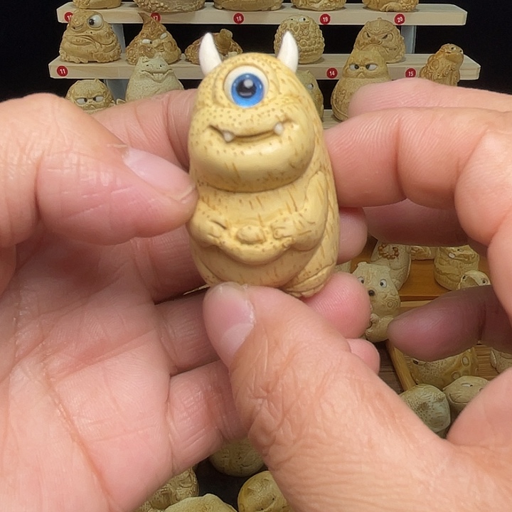柠***酸竹竹根雕独眼手把件