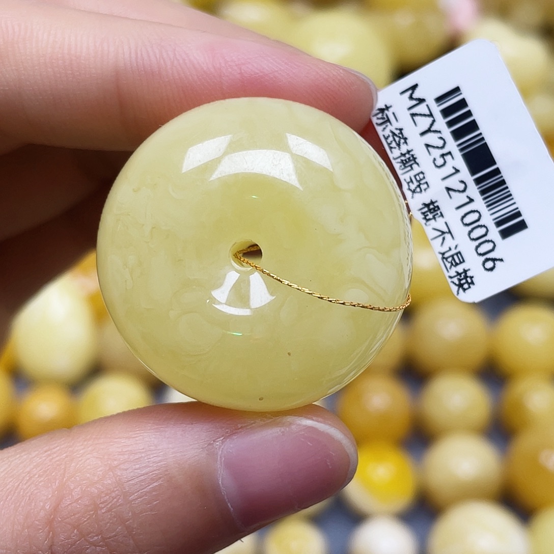 蜜蜡未镶嵌裸石31.7*17.3mm.瑕