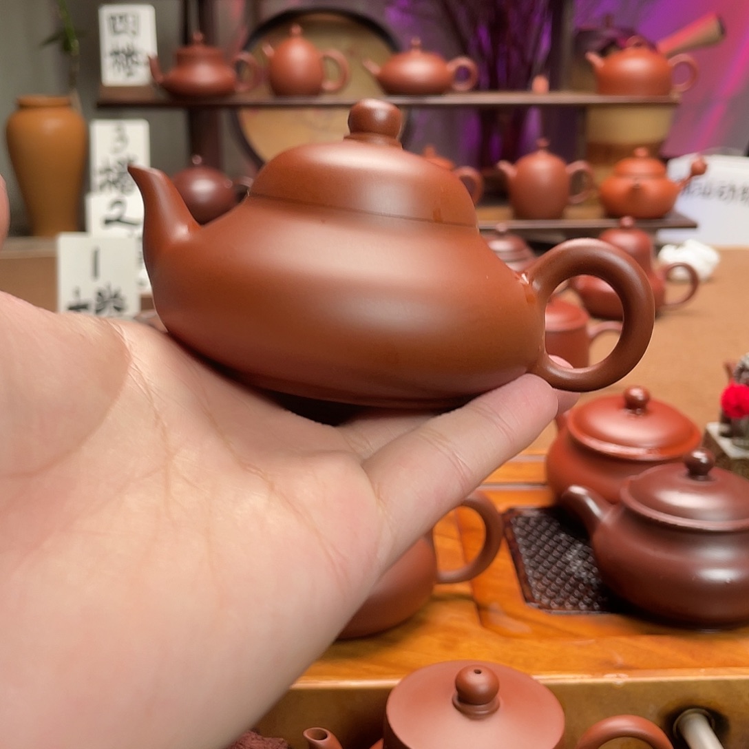 紫砂茶壶老****。梨壶手拉