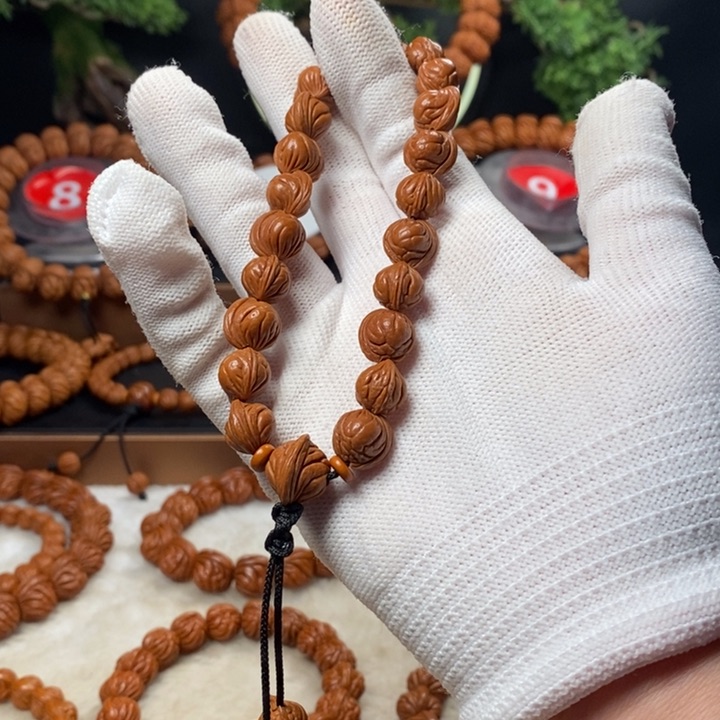 桃核吊坠(****司秦岭龙纹