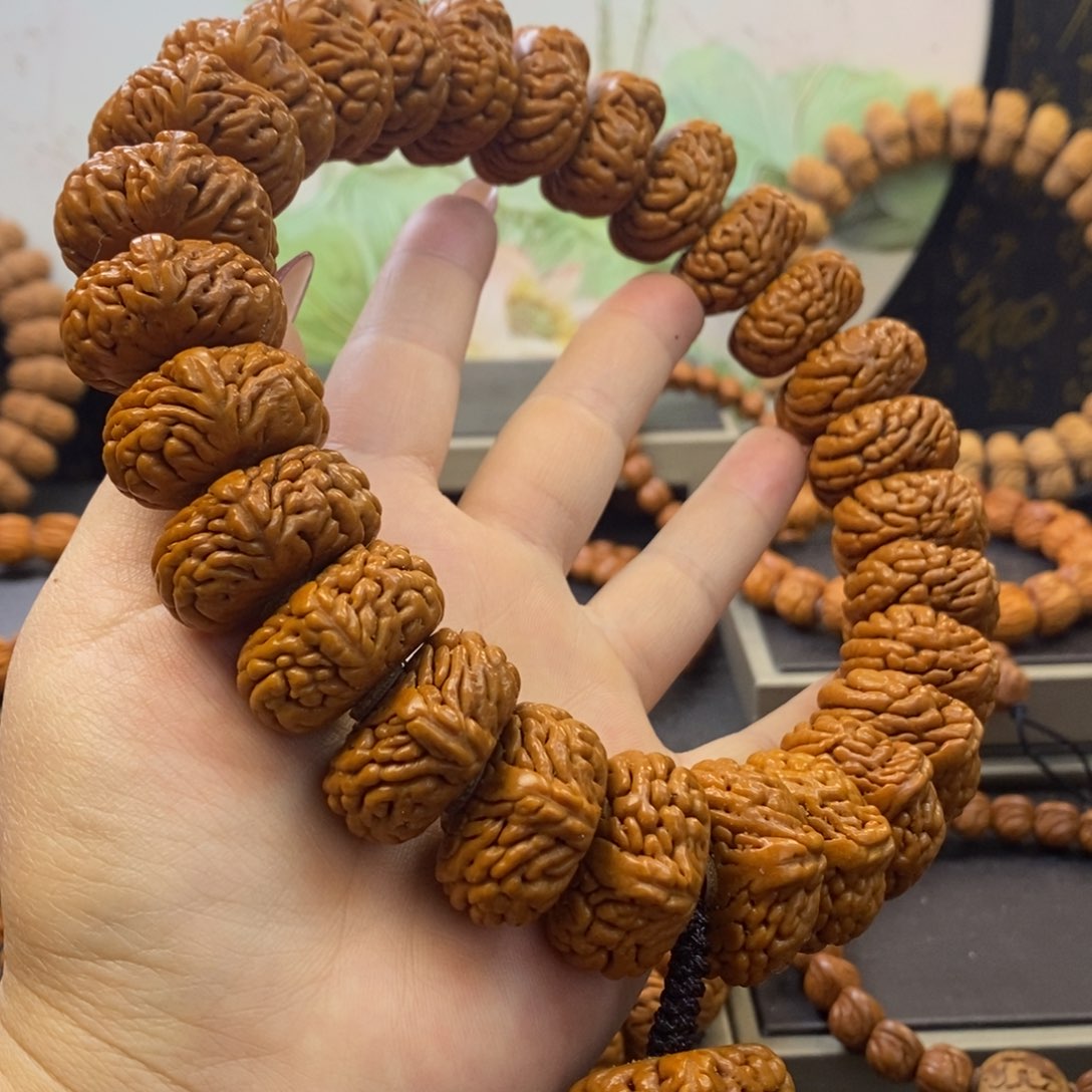 桃核手串枕***她龙纹桃核麒麟